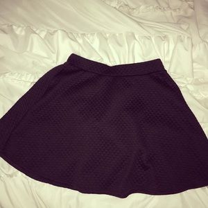 Black quilted skater skirt